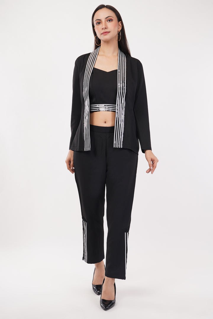 Smart pant suit with a bustier and side slit pants