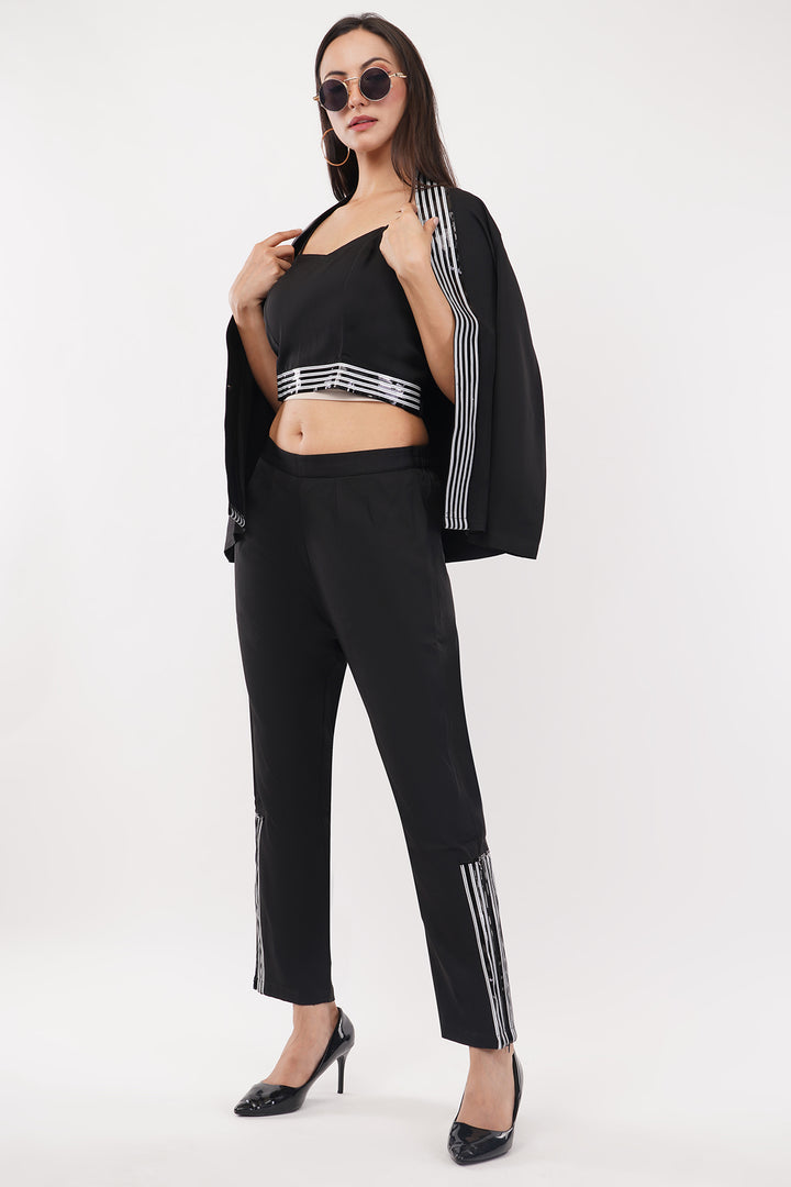 Smart pant suit with a bustier and side slit pants